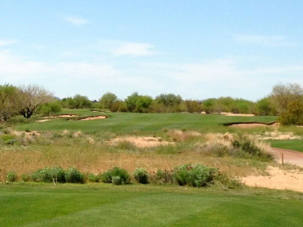 Now the golfer turns around and plays a solid 450 yard two shotter that turns slightly left from tee to green.